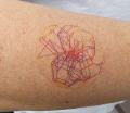 Energie-Tattoo auf Arm